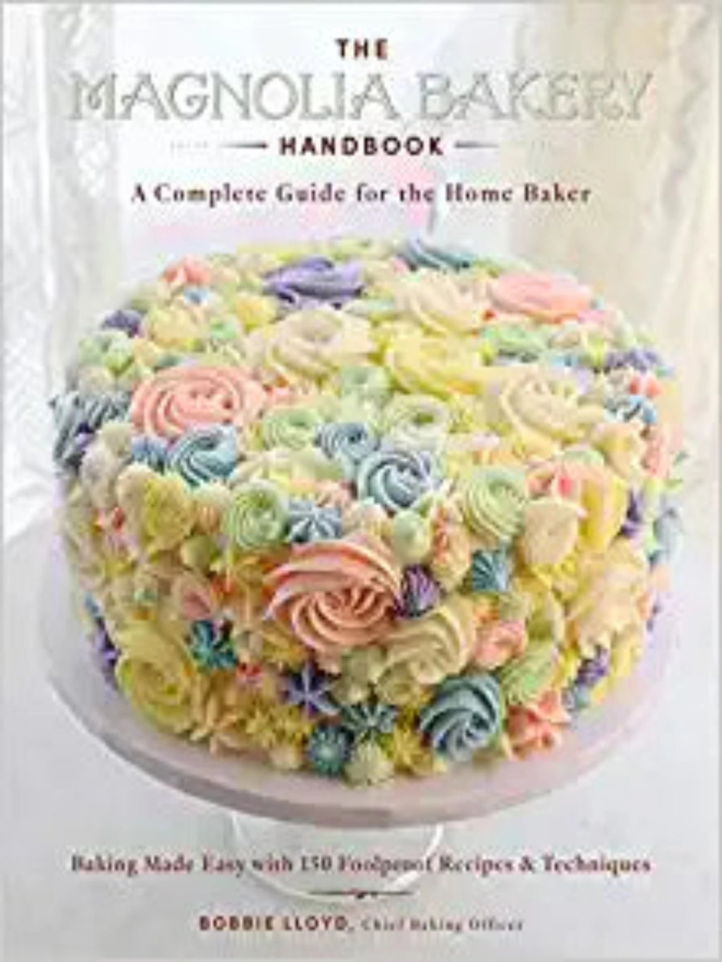 Front cover of book featuring colorfully decorated cake