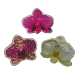 Set of three magnets: one fuchsia-and-white pattern orchid, one fuchsia orchid, and one white orchid; each has the Hillwood logo overlayed
